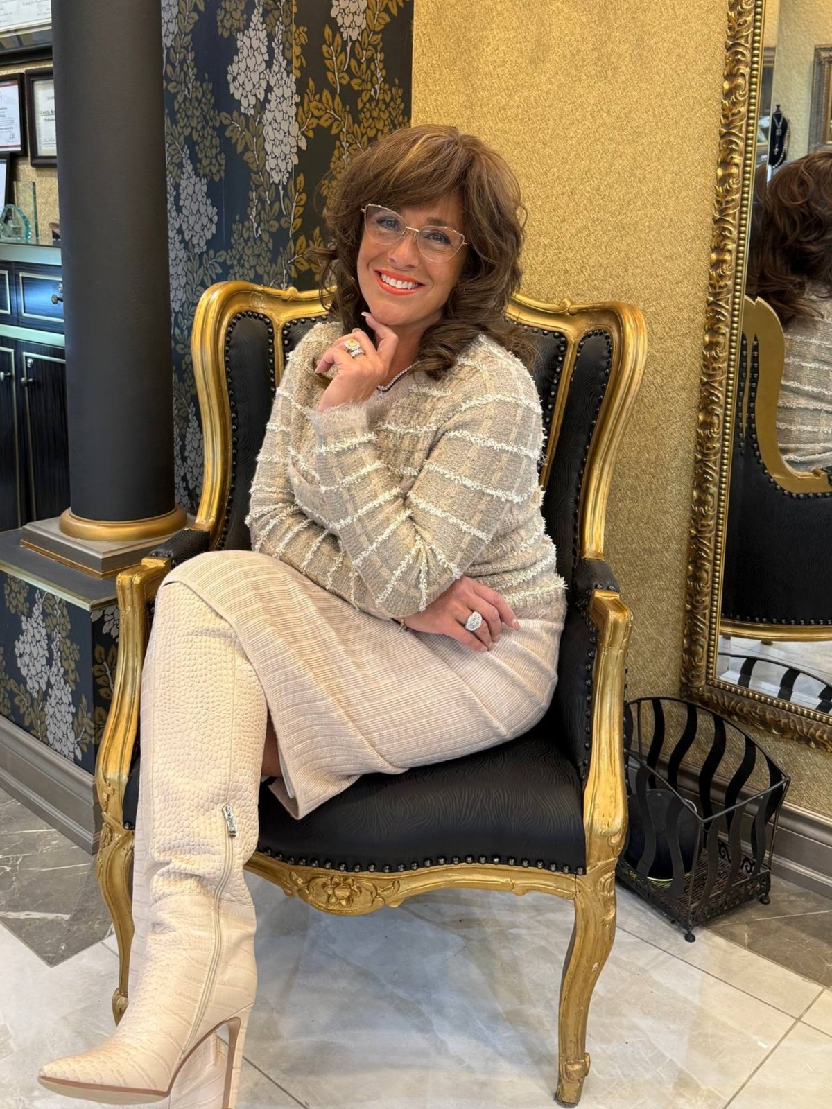 Colette seated in the store