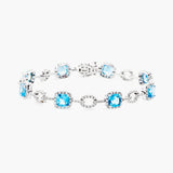 Blue Topaz and Diamond Halo Bracelet