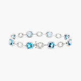Blue Topaz and Diamond Halo Bracelet