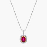 Ruby and Diamond Oval Halo Pendant Necklace