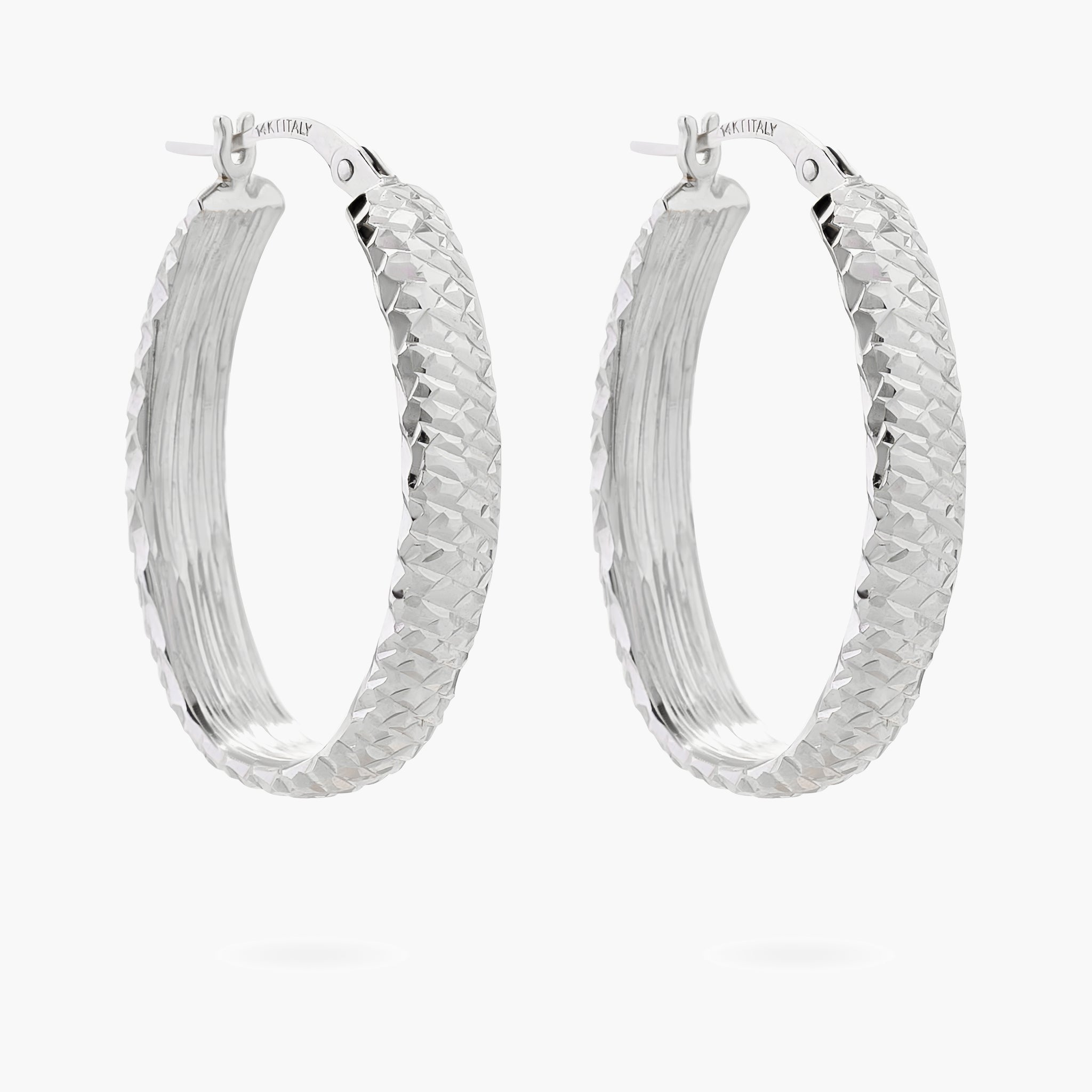 Diamond cut oval hoop earrings