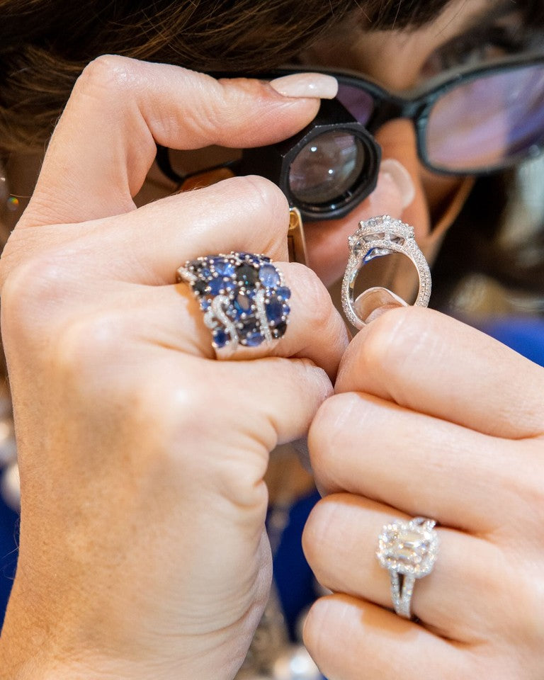 Diamond rings examined through a loupe